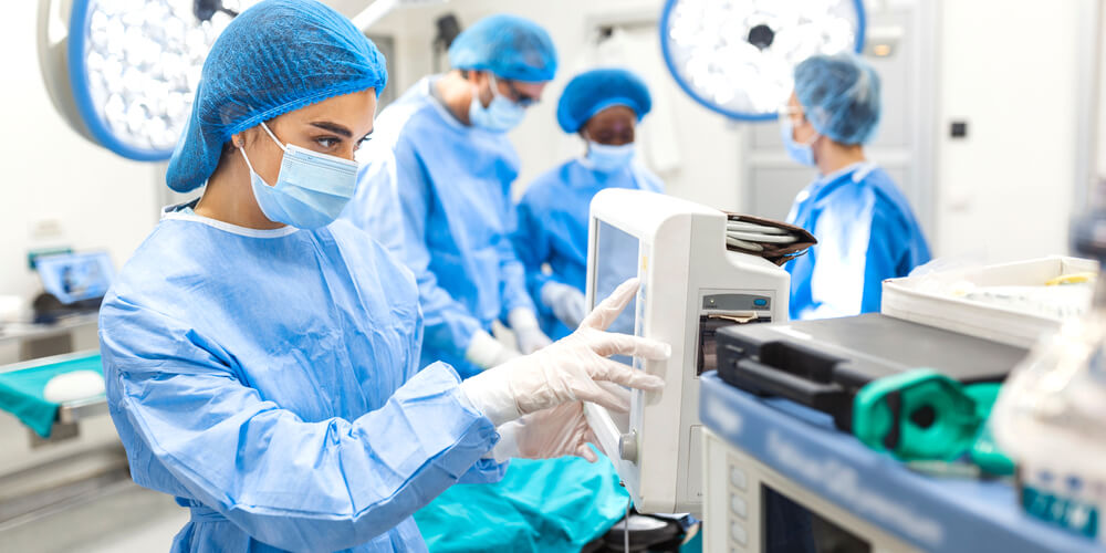 Clinician using a tablet in a professional care setting